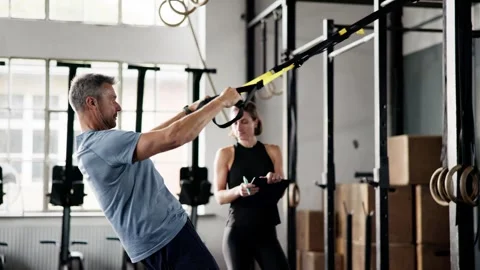 Suspension Training Workout. Sport Exercise In Gym Stock Footage 287824029