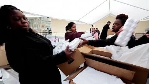 Suspension of US food program leads beneficiaries to seek help from food banks,  Video stock 321098540