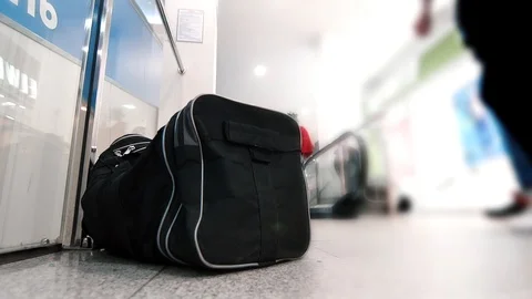 Suspicious bag at the mall,slow mo Stock Footage 90676329