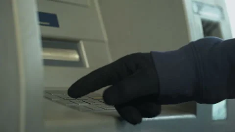 Suspicious man in gloves inserting pin code, stealing money from bank account Stock Footage 90910882