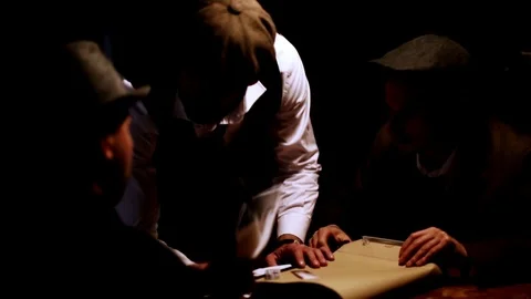 Suspicious man questioned by detectives in interrogation room Stock Footage 120364832