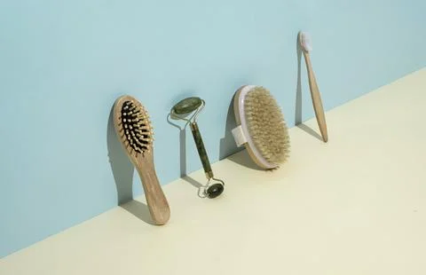 Sustainable career eco accessories brushes for self care and body care. Stock Photos