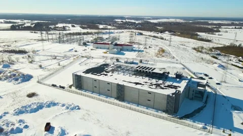 Sustainable Data Center Complex and Electrical Substation in Snowy Landscape Stock Footage 331700770