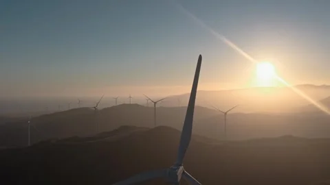 Sustainable development. Windmill blades rotate produce power. Wind turbines. Stock Footage 306338654