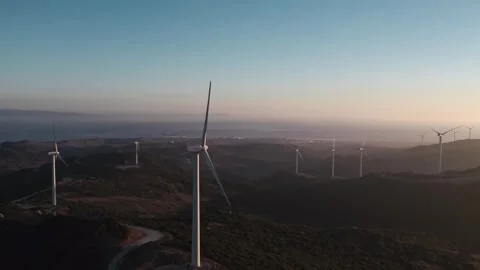 Sustainable development. Windmill blades rotate produce power. Wind turbines. 動画素材 306338711