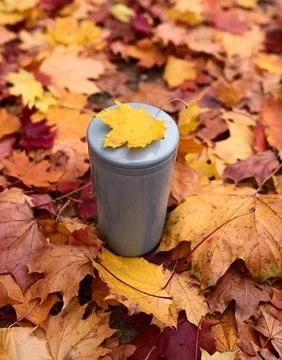 Sustainable Reusable Drinkware with a Maple Leaf on the Lid Representing Plastic Photos