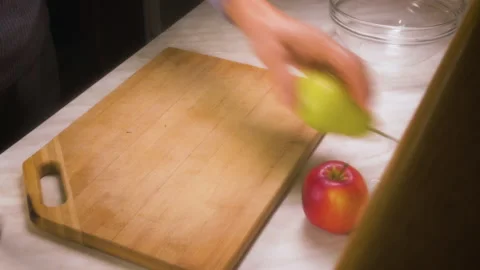 Сutting a pear in half Stock Footage 162133634
