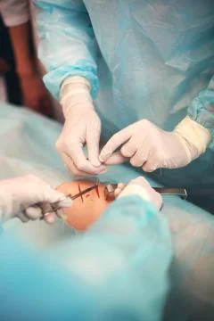 Suturing wounds Stock Photos