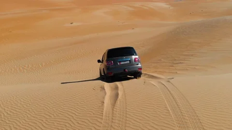 Suv Car Goes Down From Desert Dune Stock Footage 130066937