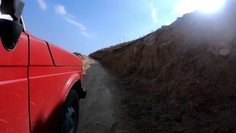 SUV a car going down from the Arashan lake on the hill Stock Footage 171211320