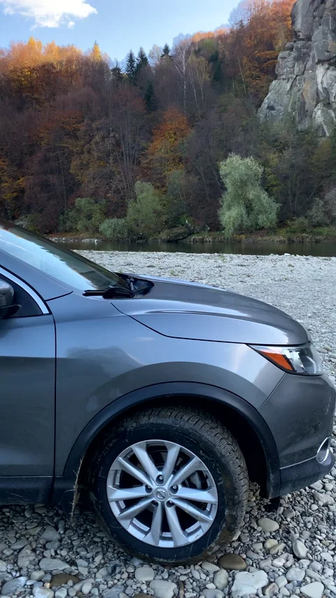 Suv car at mountain river beach Stock Footage 220419941