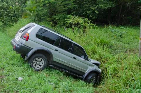 SUV in ditch, Guanacaste, a province of Costa Rica located in the northwestern Stock Photos