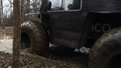 The SUV is driving in the forest off-road Stock Footage 267805570