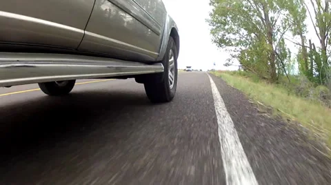 An suv driving on a road Stock Footage 29620490