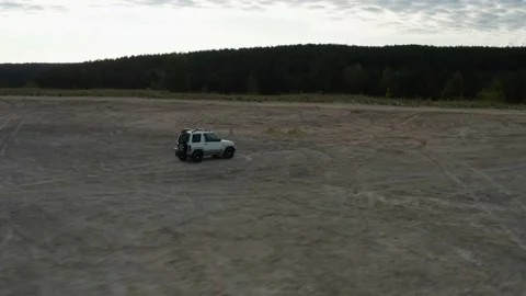 The SUV is driving on the road Stock Footage 171312286