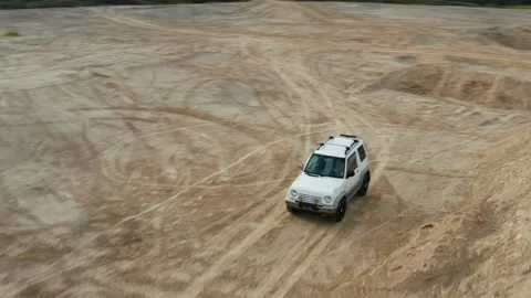 The SUV is driving on the road Stock Footage 171316610