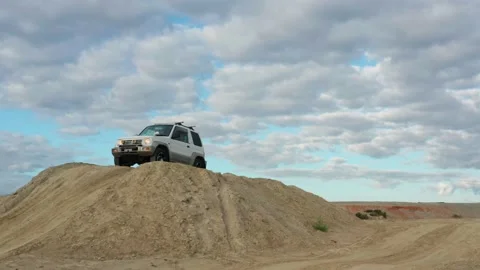 The SUV is driving on the road Stock Footage 171319529
