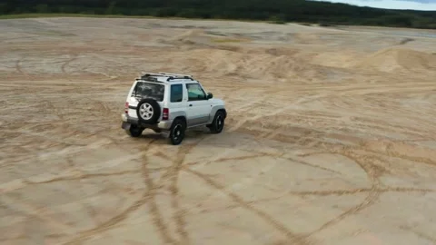 The SUV is driving on the road Stock Footage 171559608