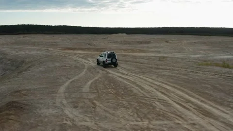 The SUV is driving on the road Stock Footage 171565508