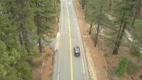 SUV (Durango) Driving through Lake Tahoe Stock Footage 156470382