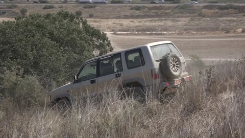 SUV in the field Stock Footage 82415473