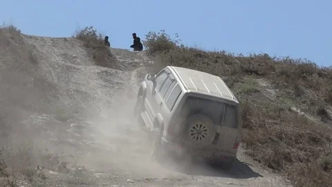 SUV going up hill Stock Footage 82415152