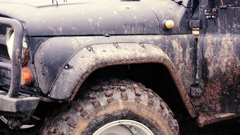SUV in the mud. Slow motion Stock Footage 74537420