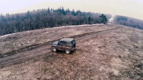 SUV in the mud. Slow motion Stock Footage 74537431