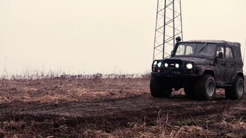 SUV in the mud. Slow motion Stock Footage 74537493