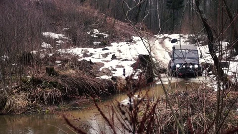 SUV in the mud. Slow motion Stock Footage 74537534