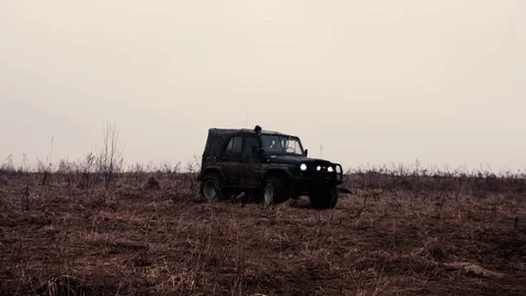 SUV in the mud. Slow motion Stock Footage 74537535