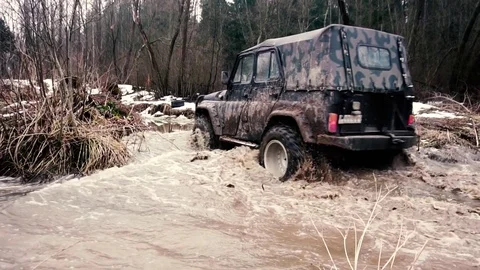 SUV in the mud. Slow motion Stock Footage 74537568
