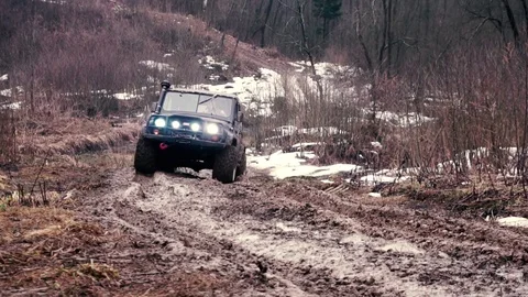 SUV in the mud. Slow motion Stock Footage 74537583