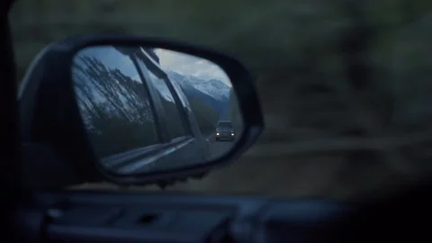 SUV Reflection in Side Mirror Mountain Road Stock Footage 320601452