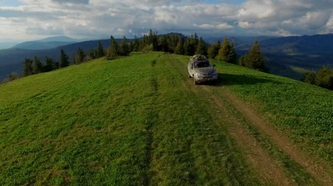Suv Rides Through the Mountains of the Carpathians. May 2016 Ukraine Stock Footage 63374245
