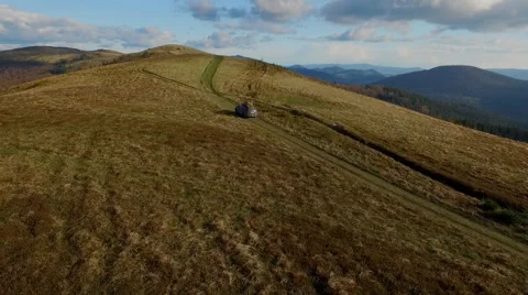 Suv Rides Through the Mountains of the Carpathians. May 2016 Ukraine Stock Footage 63376213