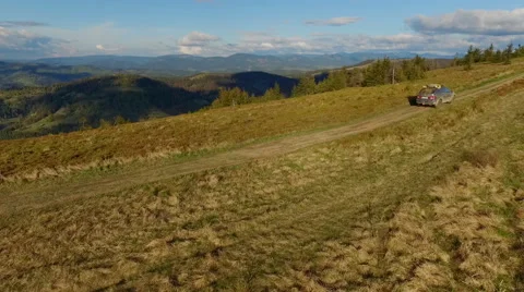 Suv Rides Through the Mountains of the Carpathians. May 2016 Ukraine Stock Footage 63376802