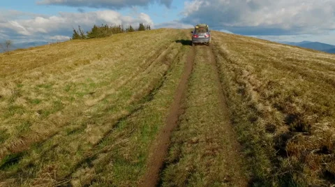 Suv Rides Through the Mountains of the Carpathians. May 2016 Ukraine Stock Footage 63378404