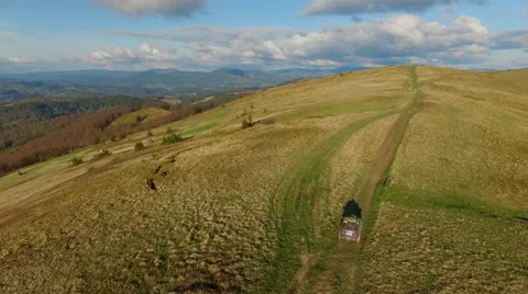 Suv Rides Through the Mountains of the Carpathians. May 2016 Ukraine Stock Footage 63379747