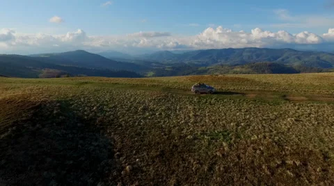 Suv Rides Through the Mountains of the Carpathians. May 2016 Ukraine Stock Footage 63379964