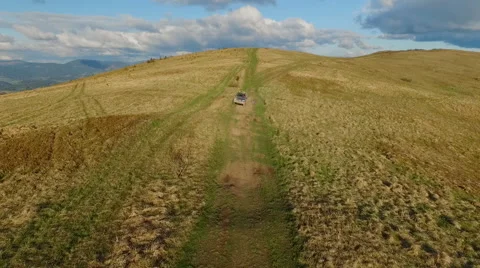 Suv Rides Through the Mountains of the Carpathians. May 2016 Ukraine Stock Footage 63390570