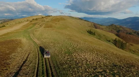 Suv Rides Through the Mountains of the Carpathians. May 2016 Ukraine Stock Footage 63390654