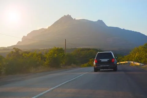 SUV on road in mountain Stock Photos