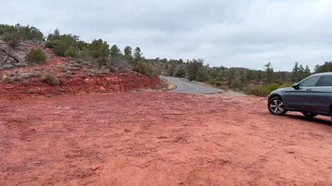 SUV on Rocky Red Dirt Path Stock Footage 276192791