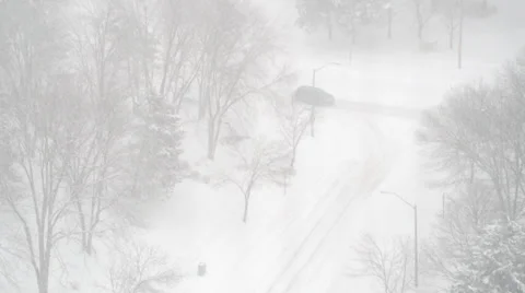 SUV in Snowstorm Stock Footage 34742675