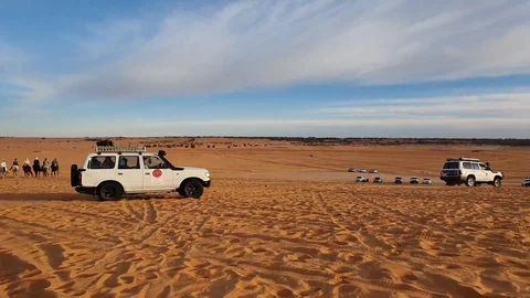Suv Trip For Tourists In The Desert Adventure In Arabian Desert At Sunset Stock Footage