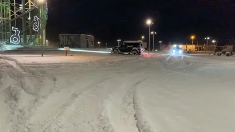 SUVs drive in the snow Video stock 166337597