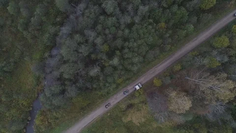 SUVs go through the forest Stock Footage 101662539