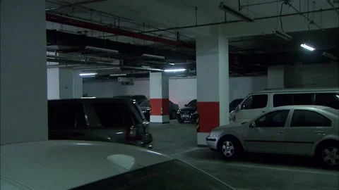 Suvs in underground garage startup Video stock 235279687
