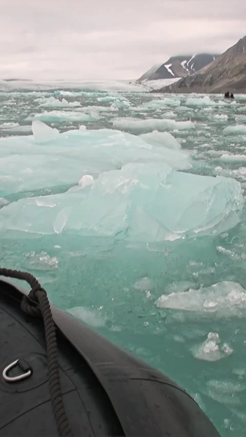Svalbard Expedition Through Turquoise Ice Fields Stock Footage 340483936